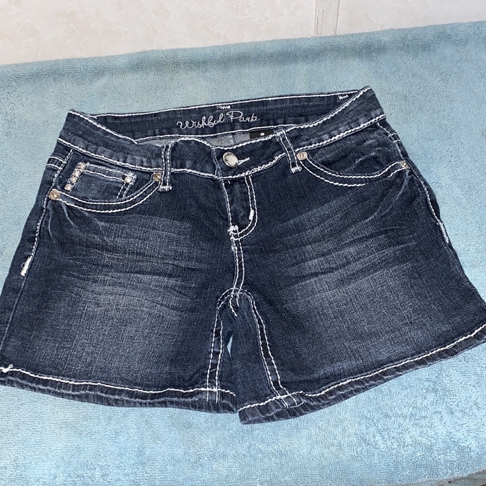 Jean shorts, with designs on back pockets